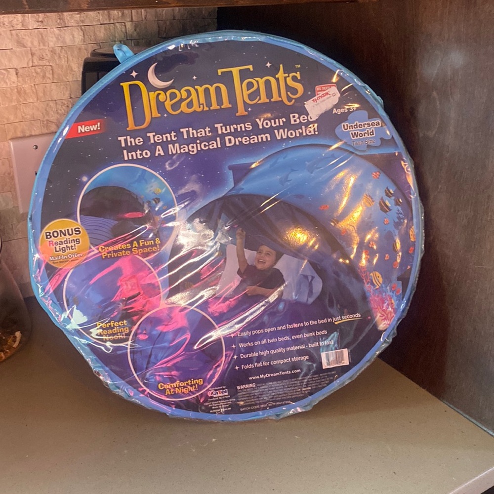 Gifted to us and never used Dream Tents bed tent. Undersea world twin bed size.